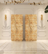 A pair of Boca do Lobo Lapiaz Cabinets in poplar root styled in a luxury interior