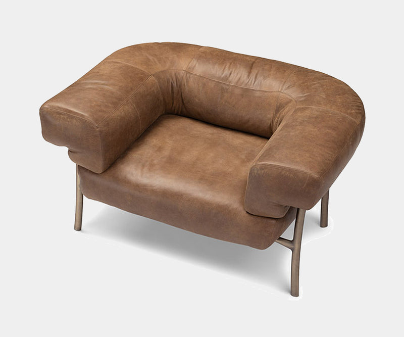 Luxury interior design statement piece, the Katana Lounge Chair by Ghidini 1961.