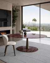 Rastrema Oval Pedestal Luxury Dining Table in a room setting
