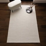 Risacca Natural Wave Luxury Rug, shown in a room setting