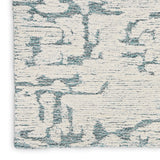 Sculptural Teal Wool Luxury Rug, available from Touched Interiors UK