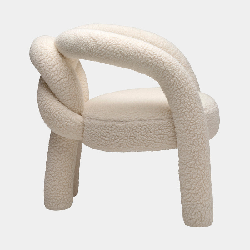 High-End Home Furniture: Unwind in unparalleled comfort with the Shibari Armchair by Visionnaire. This modern armchair boasts a love knot design and inviting teddy bear fabric.