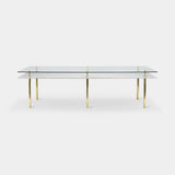 Sottile Brass Column Luxury Dining Table, shown with a glass top