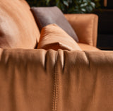 Tessuto Bronze Plate Luxury Sofa, goose down cushion detail