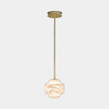 United Alabaster Cadaqués Cala Pendant Light in natural alabaster, studio view on grey