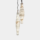 United Alabaster Kavanagh Pendant Light in natural alabaster, studio view on grey