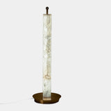 United Alabaster Roller Floor Lamp in natural fluted alabaster, studio view on grey