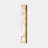 United Alabaster Roller Wall Light in natural alabaster, studio view on grey