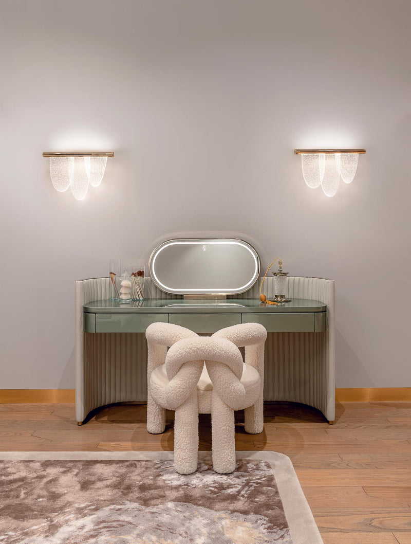 Modern Sculpture Armchair: As much art as furniture, the Shibari Armchair by Visionnaire features a love knot design and is a conversation starter in any space.