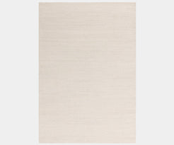 Zander Ivory luxury rug featuring a natural wave design for high-end home decor.