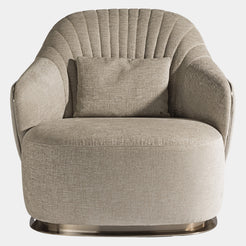 Visionnaire's Adele Armchair: The epitome of luxury seating. This modern armchair features customisable upholstery, plush comfort, and a variety of metal finishes for a touch of Italian design flair.