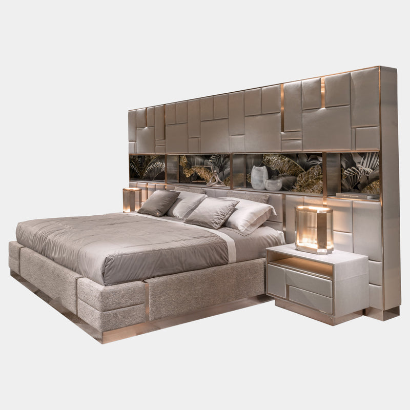 The Beloved Art Bed by Alessandro La Spada & Michele Astolfi: Art meets luxury. This Italian-made bed boasts a captivating geometric headboard with Swarovski crystals, integrated storage showcasing a mesmerising artwork, and a plush upholstered base.