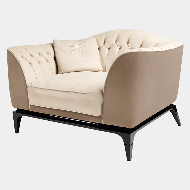 Luxury Italian Seating: The Freyr Armchair by Visionnaire features a seamless design with contrasting stitchwork, available in leather or fabric upholstery.