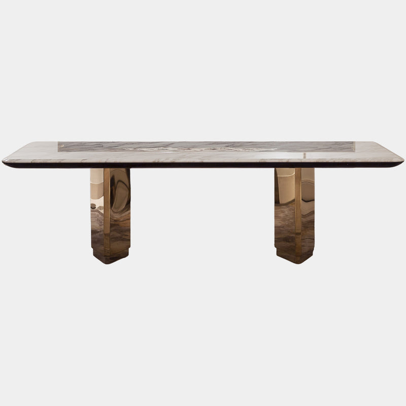Visionnaire's Galitsin Dining Table: A fusion of art and dining. This Art Deco masterpiece features a polished stainless steel and copper infused marble top with a hand-crafted artistic insert, creating a luxurious centrepiece for your dining space.