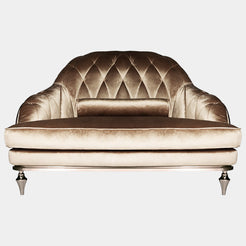 Visionnaire's Hagal Armchair: A throne of comfort and sophistication. This Italian-designed armchair features a curved wood frame, luxurious diamond-quilted velvet upholstery (customisable fabric options available), Memory Foam® comfort, and chrome-finished aluminum details for a touch of modern luxury.