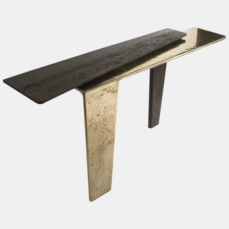 Luxury Italian Console Table: The Lego Console Table by Visionnaire offers a statement piece for your entryway or living space. This modern design combines textured cement with customisable, hand-polished aluminum.