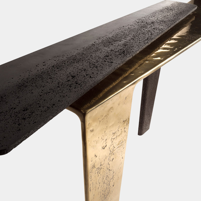 Textured Cement and Metal Console: Visionnaire's Lego Console Table features a striking contrast between rough-textured, matte black cement and luxurious, hand-finished aluminum.