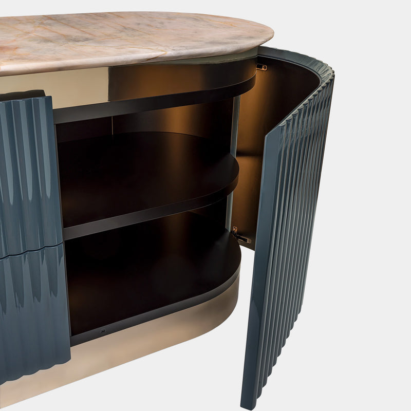 Hand-Carved Details on Modern Dresser: The Visionnaire Leonardo Dresser boasts exquisitely hand-carved canneté motifs on the doors, showcasing Italian craftsmanship and meticulous attention to detail.