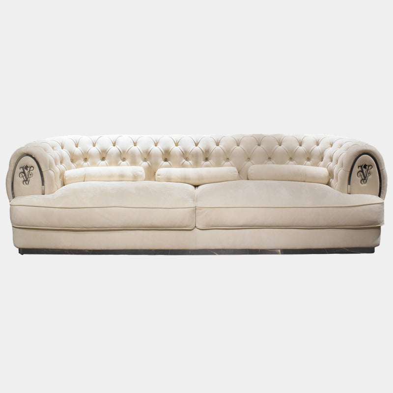 Visionnaire Oberon: Luxurious modern sofa in opulent design, featuring sculpted curves, plush comfort, and customisable metal accents.