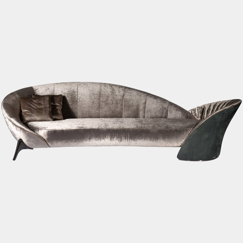 Visionnaire's Presence Sofa: A captivating masterpiece for the discerning homeowner. This Italian-designed sofa features an asymmetrical design, a luxurious mix of upholstery options, plush Memory Foam® comfort, and customizable wood or metal finishes for a touch of personalised luxury.