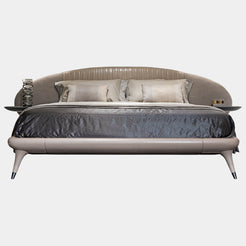 Visionnaire Princess Bed Frame: Modern luxury bed frame featuring a curved headboard, customisable leather or fabric upholstery, and metal-capped legs.