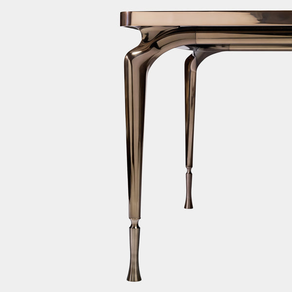 Luxury Italian Dining Table: The Thule by Visionnaire features a dramatic Marquina Black marble top and a sleek, polished stainless steel base.