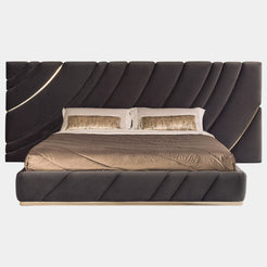 Visionnaire Ultrasound Bed: Modern luxury bed featuring a wave-design headboard with stainless steel details and a plush, upholstered frame.