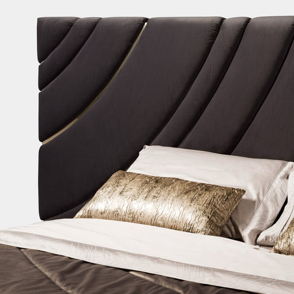 Luxury Italian Bed Frame: The Ultrasound Bed by Visionnaire offers a stunning centerpiece for your bedroom with its wave-pattern headboard and sleek stainless steel accents.